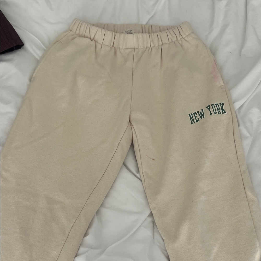 Brandy Melville Cream Track Pants with New York Print